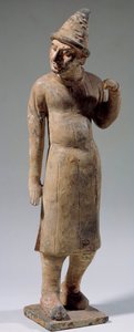Chinese art: Sogdian, barbarian terracotta statuette with pointed hat carrying silk