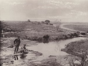 Panning Ore to Discover Gold (b/w photo) by South African Photographer