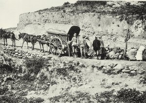 Unloading a cart of firearms, in order to climb the Dersa Hills, Tetouan, Morocco by Spanish Photographer