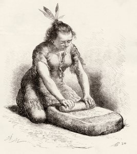 A native Guayan woman crushing grain