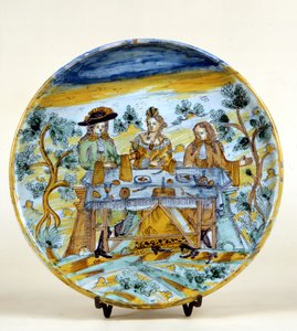 Representation of an outdoor banquet on a ceramic plate of Talavera de la Reina (Spain). Early 16th century. Milan, Museo del Castello.
