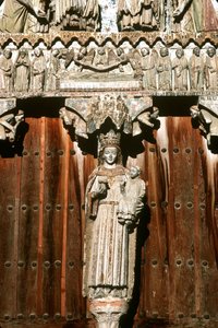 The west portal with statue of Madonna and Child and relief of the Last Judgement