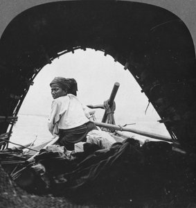 A boatman on the Irrawaddy River, Burma