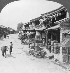 Main Business Street of the Chinese Quarter, Bhamo, Burma by Stereo Travel Co