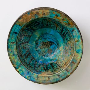 A 14th century turquoise Raqqa ceramic dish by Syrian School