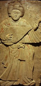 Terracotta stele with musician, Tang Dynasty (618-907), discovered in Shaanxi Province, Steles Forest Museum in Xian. Photography, Leonard de Selva, China, 2006. by Tang Dynasty Chinese School