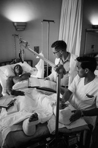 American soldiers wounded in the Vietnam War are airlifted to a hospital at Clark Air Base by Ted Spiegel