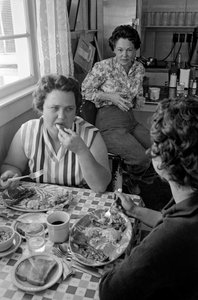 Women chat over breakfast in a diner in Oregon
