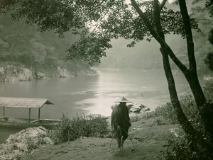 Fisherman by the Hozu River, Arashiyama District, Kyoto, circa 1900 - 1915 by Teijiro Takagi