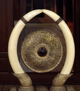 A Gong Hanging from Elephant Tusks