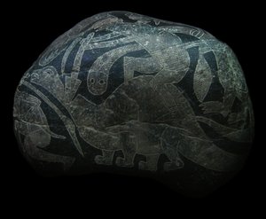 The Ica Stone. A Man Killing a Dinosaur by The Ica stones.
