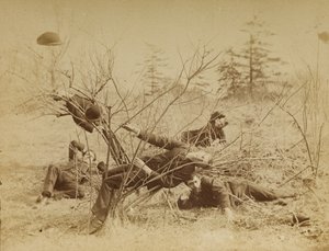 [Four male students reclining al fresco] by Thomas Eakins
