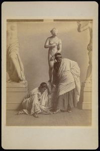 Two Male Students in Grecian Costume Before a Plaster Cast of Aphrodite in the Cast Room of the Pennsylvania Academy by Thomas Eakins