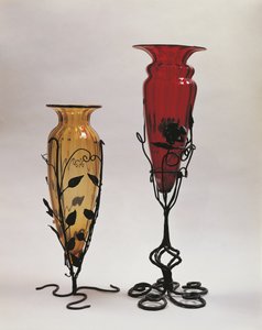 Close-up of two vases in iron stands, Murano, Venice, Veneto, Italy
