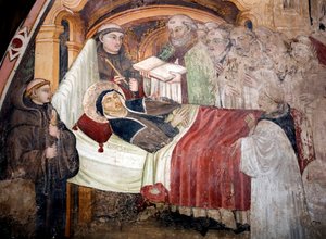 The Death of Saint Scholastica, Sister of Saint Benedict of Nursia. Surrounded by Benedictine Monks. Fresco of the Umbria School of the 15th century. Monastery of Saint Benedetto, Subiaco, Italy
