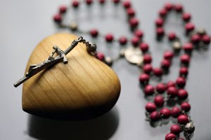 Rosary on a Carved Wood Heart