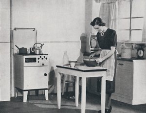A British kitchen equipped with a cabinet gas cooker by Unbekannt