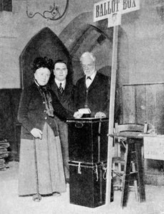 A Woman Recording Her Vote at the Ballot Box