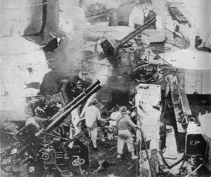 An Italian battleship is hit