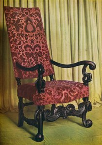 An Upholstered Arm Chair