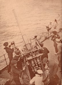 An anti-aircraft gun in action on a British battleship