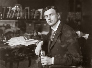 C S Rolls sitting at his desk by Unbekannt