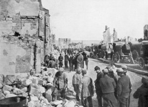 Captive German prisoners removing debris from the streets of Clermont-en-Argonne, France
