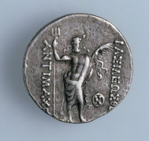 Four drachma piece, reverse depicting the Greek god Poseidon representing the Indian trident-bearing god Siva, from the Greek Kingdom of Bactria, 2nd century BC