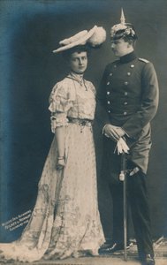 German couple. With male in dress uniform by Unbekannt