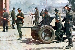 German infantrymen with light field artillery, Russia, 1943