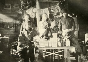 Group in the Hut in the Summer: Joyce at the Sewing Machine