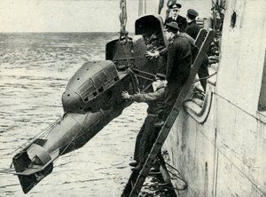Hoisting a Chariot Manned Torpedo on Board a Ship, World War II by Unbekannt