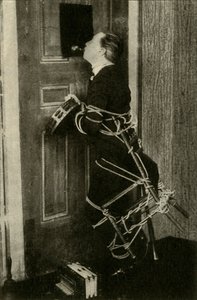 John Nevil Maskelyne Performs a Spirit Cabinet Illusion by Unbekannt