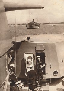 King George VI in the gun turret of H.M.S Southampton