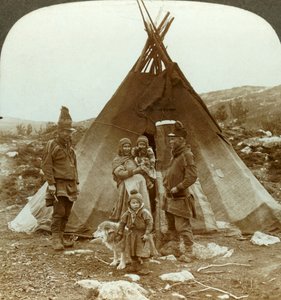 Laplander family and sledge dog - outside their summer home - on a hillside in Norway, c1905