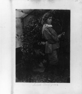 Lionel Tennyson with bow and arrow