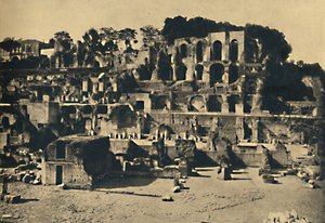 Roma - The Ruins of the house of Caligula towering above the House of the Vestal Virgins