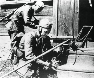 Russian Soldiers with Mine Detectors Clearing a Booby-Trapped House, Eastern Front by Unbekannt