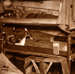 Soldiers in Wooden Bunks