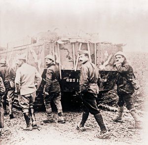 Soldiers Walking Behind Tank, c1914-c1918 by Unbekannt