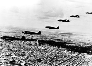 Squadron of German Heinkel He 111 bombers flying over occupied Paris, July 1940 by Unbekannt