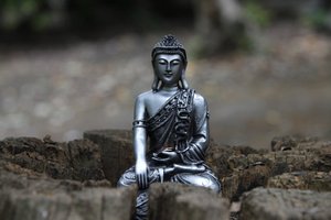 Statue in the garden of Buddhapadipa temple, Wimbledon, United Kingdom