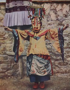 Tibetan lama attired for the devil dance