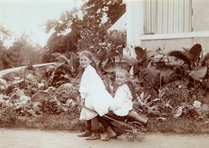 Two children playing outdoors by Unbekannt