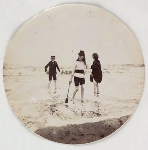 Two girls and a boy paddling in the sea, c 1890 by Unbekannt