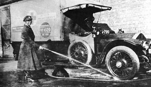 Volunteer English Woman Driver Washing Down Her Ambulance, Cambridge, World War I, 1915