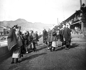 Woman Carrying Loads of Coal, Nagasaki, Japan