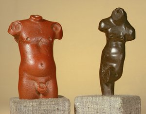 Red sandstone male torso and grey sandstone dancer, Harappa, 2300-1750 BC
