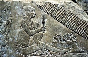 Ancient Egypt: Saqqarah: necropolis of the Old Empire, tomb of noble. Detail of reliefs representing a fisherman by Leopold Blonder