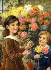 Boy and Girl cutting flowers in garden outside their home